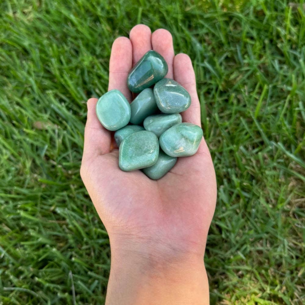 Green aventurine tumbled stone, polished sparkling green crystal for luck and prosperity