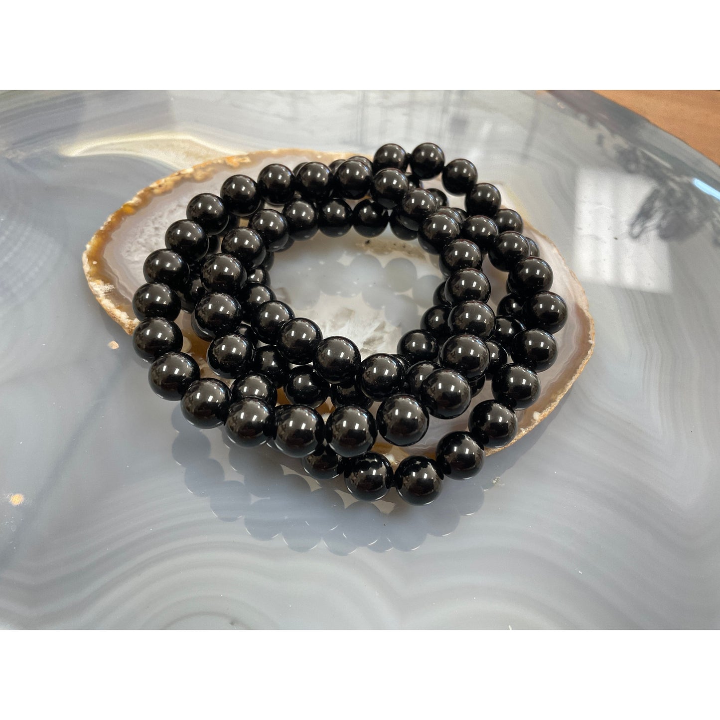 Black obsidian 8mm stretch bracelet, polished volcanic glass beads for protection and grounding