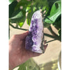 Polished amethyst base weighing 2 lbs, showcasing a deep purple hue and smooth finish, perfect for healing, meditation, and home decor.